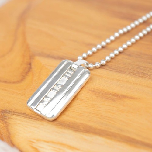 Tiffany atlas dog tag - &,
