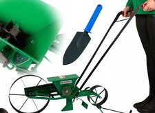 Semoir manuel à conducteur