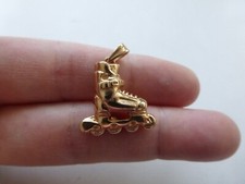 pendentif neuf patin à roulettes plaqué or poinçon, 5,93gr 2x2cm (dimensions san