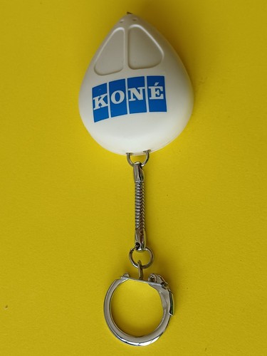 Porte clé mètre ruban - , en