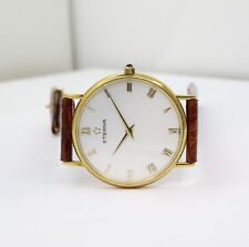 ETERNA - Montre Ronde En Or 18KT Avec Bracelet En Cuir