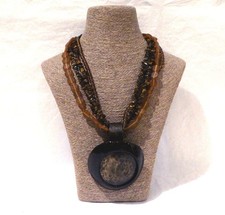 La Tribu Rigaux. Imposant collier ethnique multi rang en oeil de tigre vintage