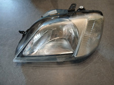 PHARE AVANT GAUCHE DACIA LOGAN