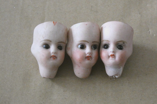 Anciennes têtes porcelaines