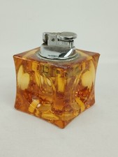Chipped glass table lighter stone to change