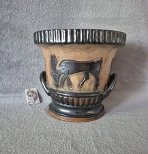 Vase / cache-pot en grès signé Roger Guérin décor antilope