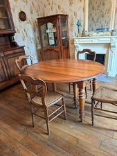 Table ovale ancienne 6 pieds sur roulette avec rallonges Louis Philippe en noyer