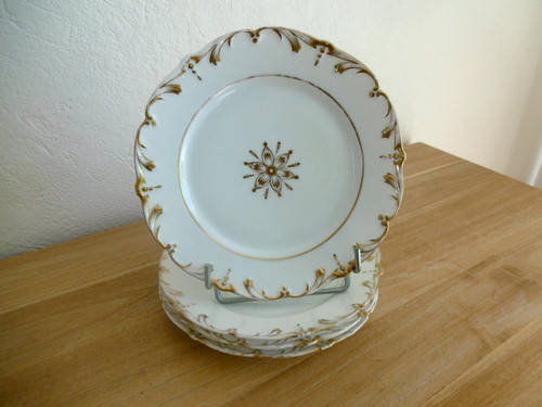 Quatre assiettes porcelaine - quatre,