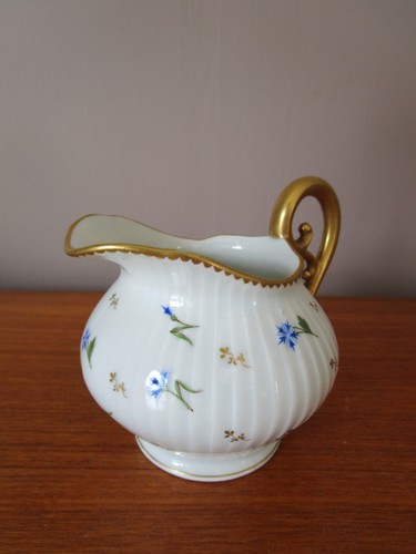 Pot lait porcelaine de - à,