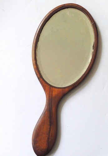 Ancien miroir face main - à,