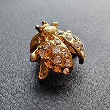 Pin's coccinelle strass insecte doré décoration vestimentaire vintage