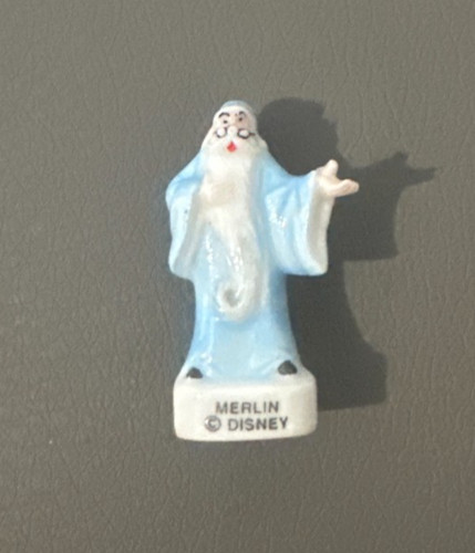 Feve merlin disney - ,