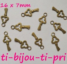 LOT de 20 PENDENTIFS BRONZE