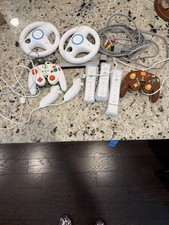 Wii Accessories. 3 Remotes. 2 Nunchucks. 2 Controllers. 2 Steering Wheels.Sensor