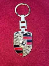 Porte-clés Porsche écusson Stuttgart métal doré émaillé rouge noir voiture