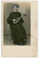 PHOTO CARD, a woman poses with a mandolin instrument music musician