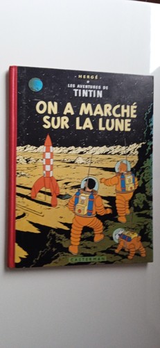 Tintin marche sur la - tintin,