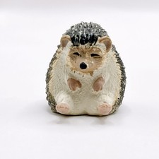 Mini figurine hérisson assis
