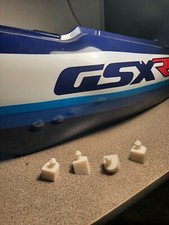 Tétons flancs de carénage SUZUKI air/huile 750 GSXR  et  1100 GSXR