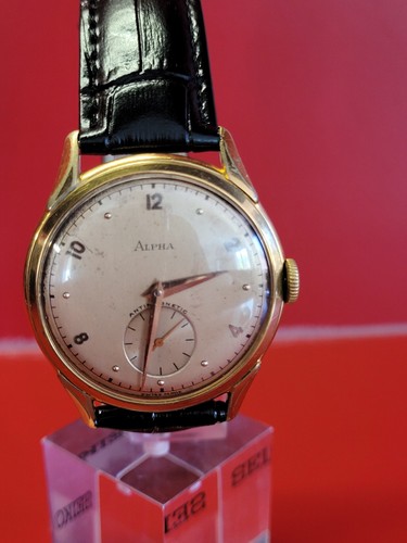 Ancienne montre homme alpha - homme,