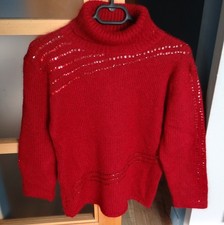 Pull col roulé rouge avec