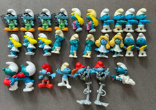 Lot 27 figurines schtroumpfs