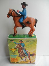 Cowboy en plastique sur cheval