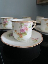 6 FLORAL AND GILDING LIMOGES PORCELAIN COFFEE CUPS & SUB CUPS