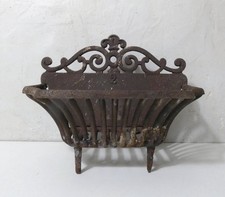 ancien porte buches en fonte