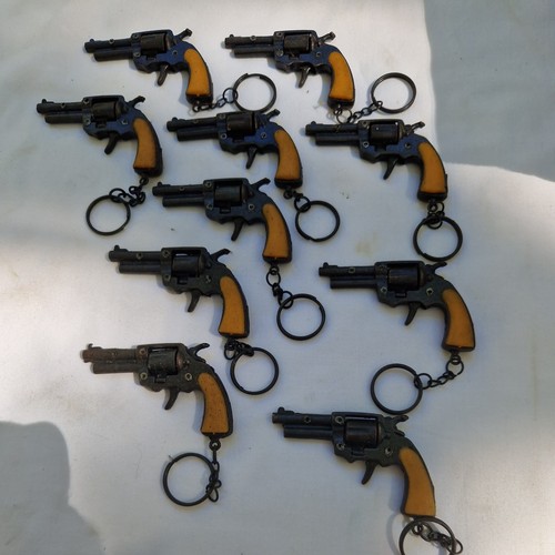 Porte clé jouet pistolet - porte,