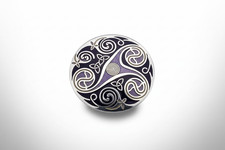 Broche triskèle celtique