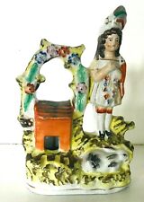 sujet en faïence fine anglaise représentant jeune bergère au puits . XX siècle .