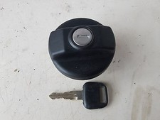 Bouchon réservoir avec une