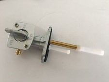 UN ROBINET D ESSENCE NEUF QUAD