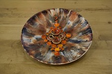 Assiette murale en céramique