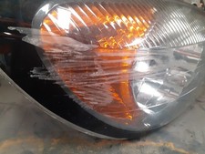 89005900 phare droit NISSAN
