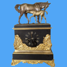 horloge pendule 1827 sculpture bronze chevaux mouvement Pons cachette pièces or