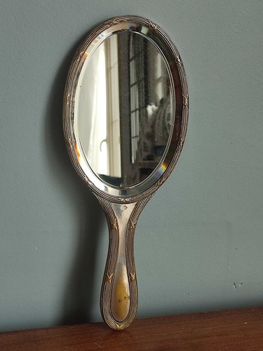 Miroir ancien face main en - face,