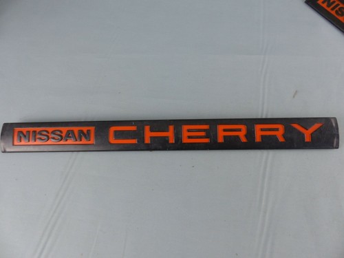 Nissan cherry sigle monogramme - nissan,