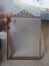 cadre ancien en métal doré