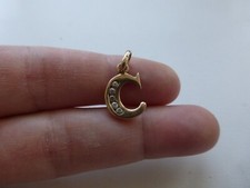 pendentif croix plaqué or jaune poinçon et zirconiums 2.50gr  2,5x1,3x2,5cm, tbé