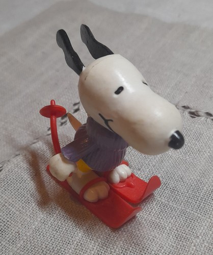 United feature snoopy peanuts - united,