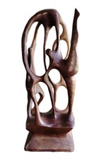 Pretty Biomorphic Wood Sculpture Dance Scene. 