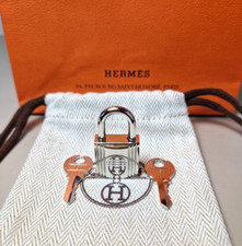 Cadenas Hermès argenté neuf/ Hermès silver palladium lock for Kelly & Birkin bag