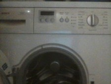 un lave-linge Bosch, Maxx vario perfect, 7 kilos, blanc.