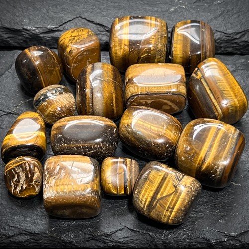 Tigers eye tumbled stones by - eye,