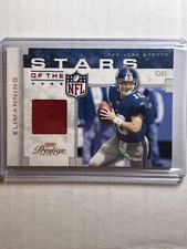 RARE # /25 GAME WORN 2008 PLAYOFF PRESTIGE STARS OF THE NFL ELI MANNING JERSEY