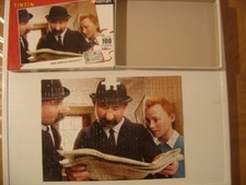 100 piece TINTIN PUZZLE actually 104 BUT MISSING ONE so 103 SEE PHOTO
