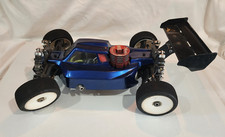 Vintage Mugen MBX6 or Losi 1/8 8IGHT-T 4WD Bruggy Nitro.