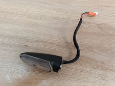 UN CLIGNOTANT ORIGINE RAYE